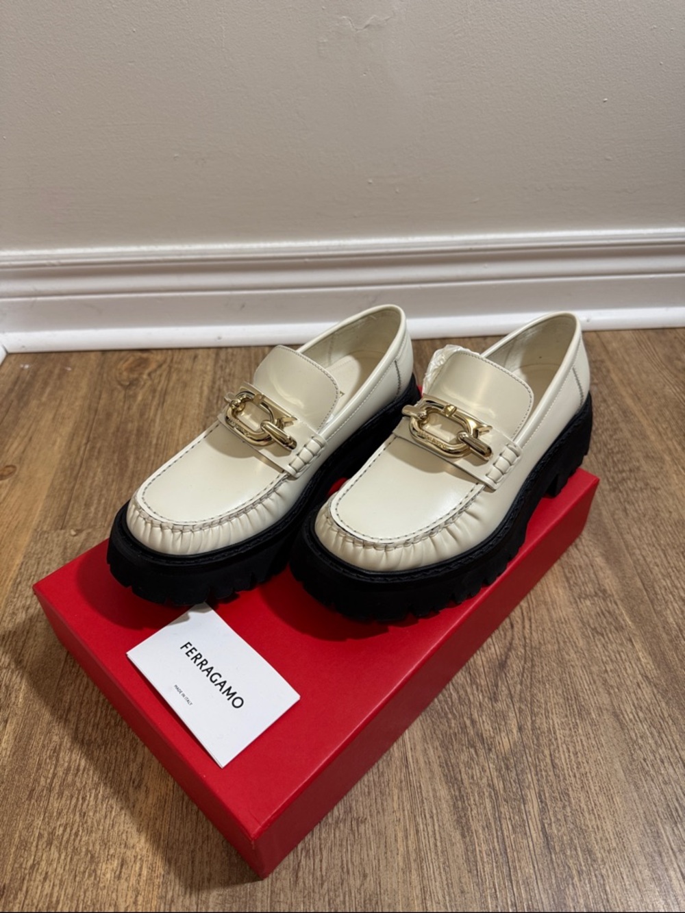 Salvatore Ferragamo Cream Leather Lug Sole Loafers with Gold Chain